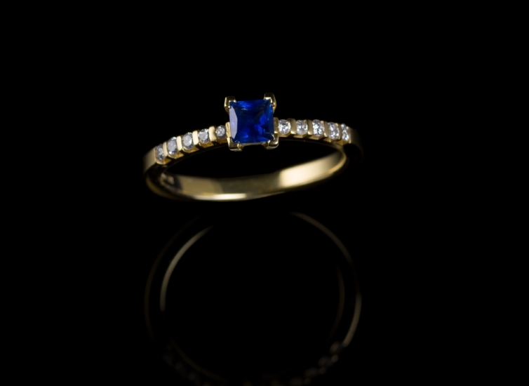 Platinum engagement ring with cushion cut diamond