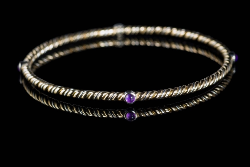 Silver and gold bangle with amethyst
